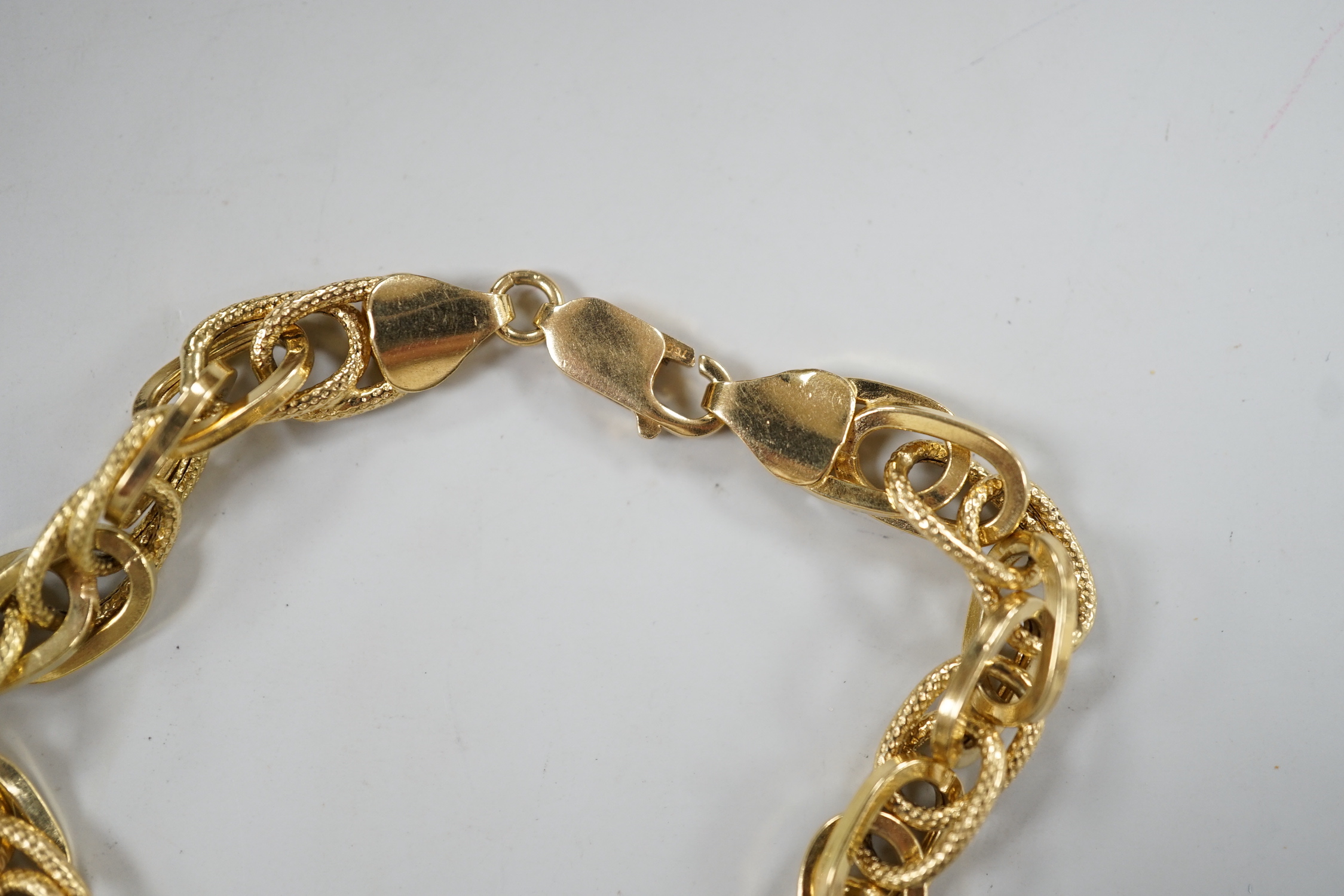 A 20th century Italian 750 yellow metal bracelet, 19cm